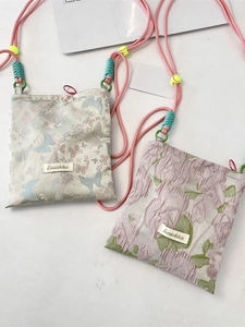 Floral butterfly crossbody phone bag with adjustable shoulder straps in two colors