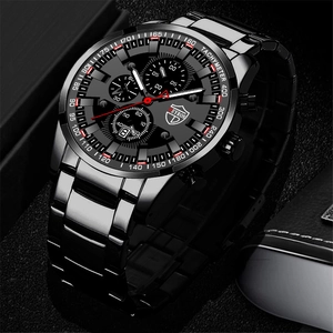 Macro shot of multifunctional quartz watch dial with luminous hands and date calendar