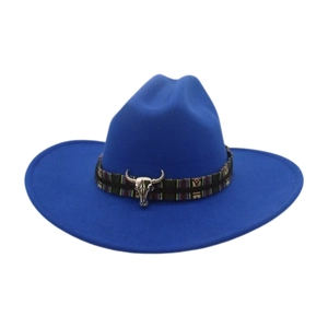 Detail of blue wool felt cowboy hat with ethnic embroidery and silver bull head emblem