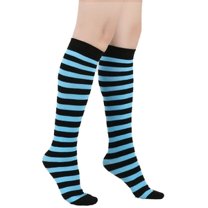 Detail of knee-high striped socks in black and blue with elastic ribbed cuffs