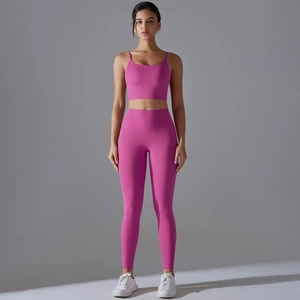 Women's rose pink yoga set featuring sports bra and high-waisted leggings for fitness