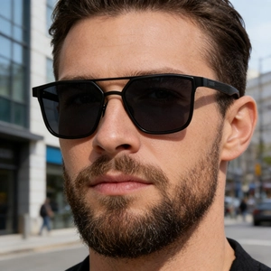 Close-up of black matte square sunglasses for men with a double bridge frame design
