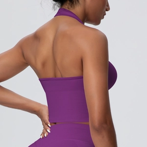 Detail of purple seamless halter yoga bra with high-elasticity ribbed knit texture