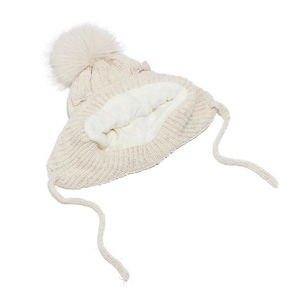 Detail of warm off-white knit baby hat featuring plush fleece lining and cute pink bows