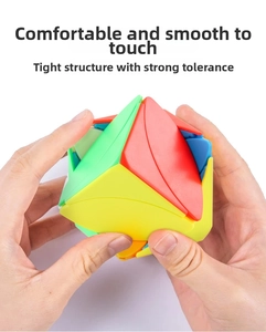 Detail of smooth turning maple leaf shape puzzle cube being twisted by hands