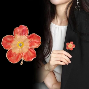 Elegant gradient orange enamel flower brooch with rhinestones and gold-plated metal finish