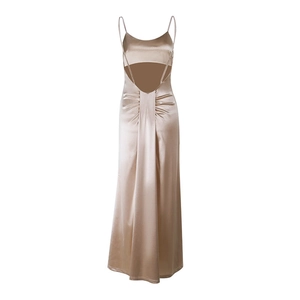 Detail of the champagne satin evening dress featuring an open back and elegant draping