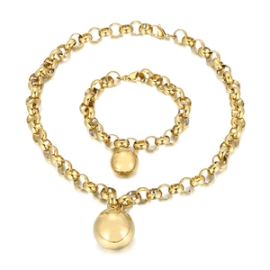 Gold stainless steel jewelry set featuring a bold chunky link chain and round ball pendants