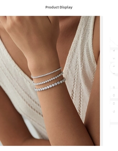 Detailed close-up of a triple-layered S925 sterling silver tennis bracelet with cubic zirconia