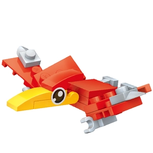 Macro shot of red and yellow miniature pterosaur building blocks model on white background