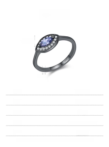 Macro detail of S925 sterling silver ring with marquise tanzanite stone and size chart