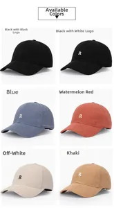 Detail showing various colors of corduroy baseball caps with embroidered R letter