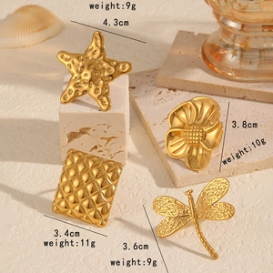 Golden stainless steel adjustable rings with starfish, flower, and dragonfly designs