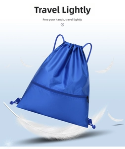Detail of blue drawstring sports bag with diamond grid texture and front zipper pocket