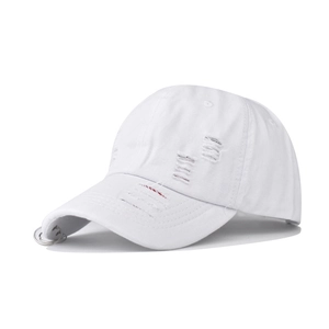 Distressed white cotton baseball cap with ripped holes, red stitching, and metal ring detail