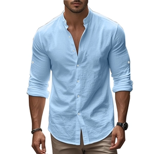 Detail of light blue slim fit cotton shirt featuring stand collar and roll-up long sleeves