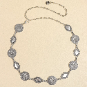 Detail of silver textured round and diamond metal links with a rose charm extender