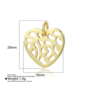Macro detail of 18k gold plated hollow heart charm with 20x18mm size specifications