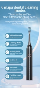 Detail view of black sonic electric toothbrush showing six smart cleaning mode settings