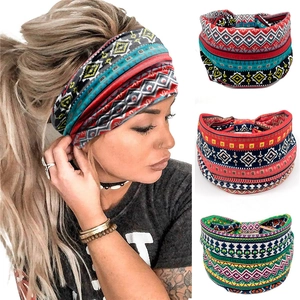 Detail of bohemian knot headbands featuring ethnic geometric prints and elastic fabric