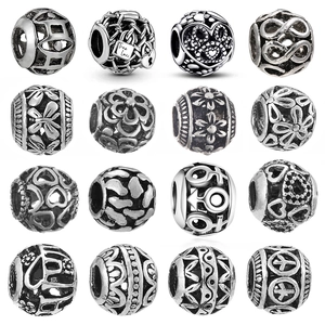 Set of 16 antique silver alloy charms and beads for DIY bracelets with floral heart designs