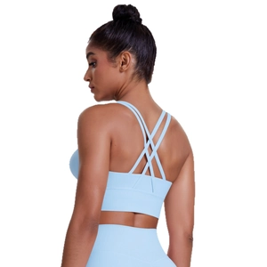 Reggiseno sportivo azzurro elasticizzato con elegante design a incrocio sulla schiena