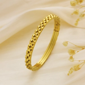 Chic gold stainless steel bracelet with industrial three-layer gear watchband texture