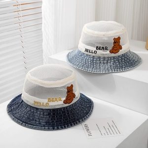 Detail of kids breathable mesh sun hat with Hello Bear embroidery and denim brim