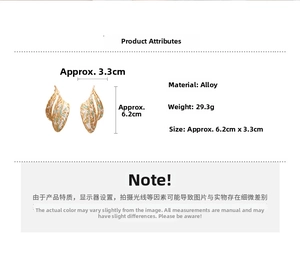 Detailed view of gold textured leaf earrings with product specs and dimensions