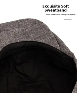 Macro shot of vintage newsboy cap interior showing grey fabric and black cotton sweatband