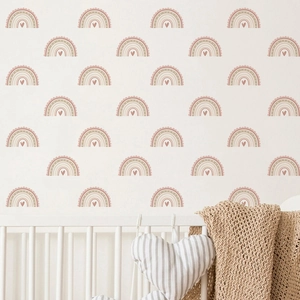 Stickers muraux arc-en-ciel avec cœurs aux tons pastels pour une chambre de bébé cosy