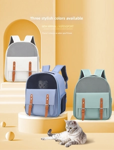 Detail view of the breathable mesh window and vintage faux leather buckles on the cat backpack
