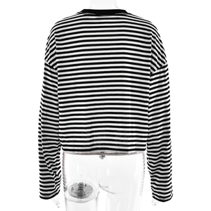 Detail view of the back of a black and white striped long-sleeve crew neck slim fit top