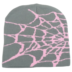 Close-up of the grey beanie featuring pink spider web jacquard knit patterns