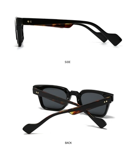 Detail of tortoise shell pattern on inner temples and golden floral rivets on sunglasses