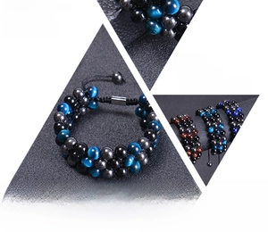 Close-up of triple-layer tiger eye stone beads bracelet with geometric composition