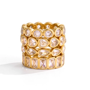 Four-piece stacked 18K gold plated stainless steel rings with white cubic zirconia crystals