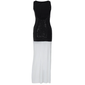 Detailed back view of a black sequin backless top spliced with white pleated long skirt