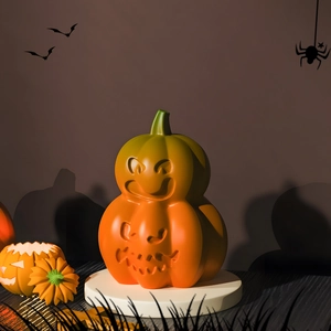 Detailed view of Jack-o'-lantern pumpkin decor with glowing gradient finish for Halloween