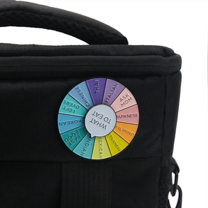 Macro shot of rotating enamel pin featuring rainbow food decision wheel with what to eat text