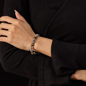 Men's titanium steel bracelet with tiger eye beads on wrist, Chinese style design