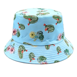 Light blue reversible bucket hat with cactus and floral print in cotton twill fabric