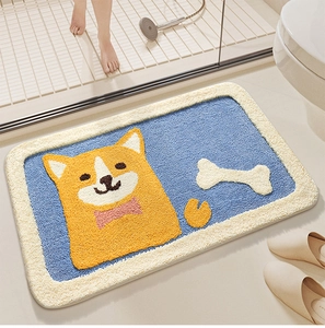 Detail of soft plush bathroom mat with cartoon shiba inu pattern placed by shower