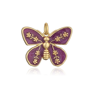 Close-up of purple enamel butterfly pendant with gold floral detail and metallic frame