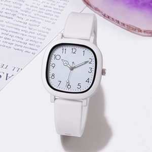 Square white quartz watch on vintage newspaper with purple agate stone decorative background