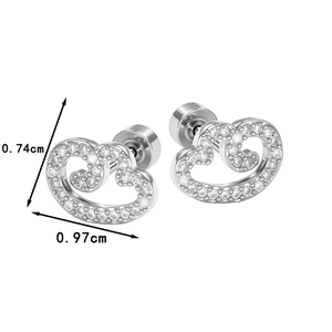 Minimalist silver wing stud earrings with sparkling cubic zirconia on white background