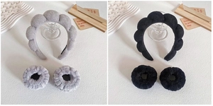 Detail of plush microfiber spa headband and wristband set for washing face in grey and black