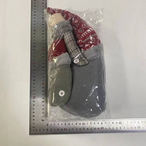 Detailed view of knitted forest gnome Christmas curtain buckle, size measurement 35x18cm