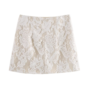 Detailed view of white floral lace fabric on a high-waisted A-line midi skirt