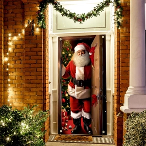 Christmas Santa Claus door cover banner hanging on a red brick house entrance